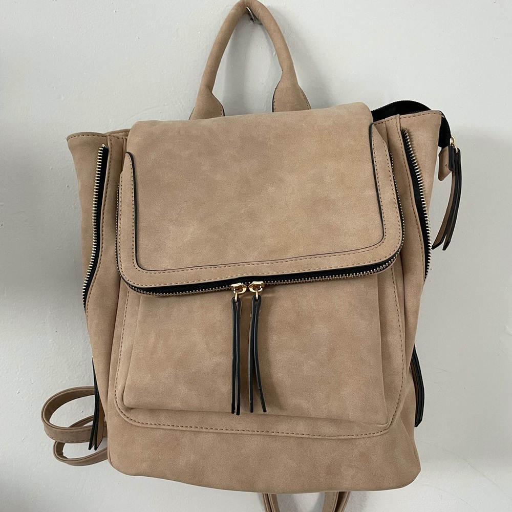 Beige back pack. Brand new. Never used.